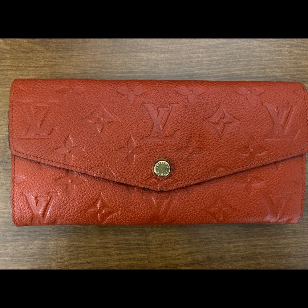 Sold ! Louis Vuitton Red Empreinte Leather Wallet